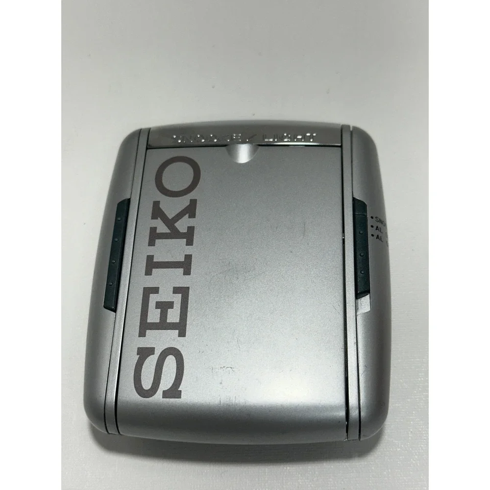 Seiko QHL004S Travel Desk Dual Alarm Clock Folding Backlit Snooze Silver
